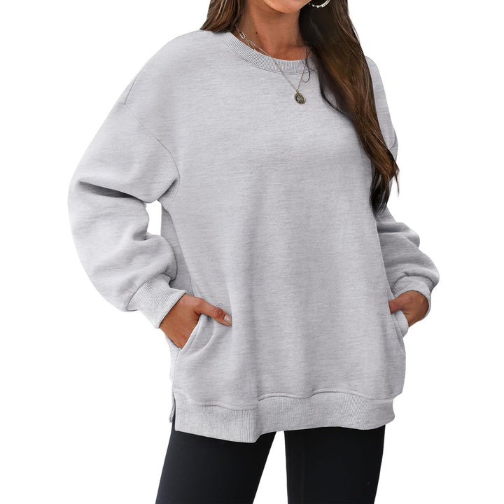 Damen verlängertes Oversize Rundhalspullover mit seitlichen Eingrifftaschen, Rippbündchen und überschnittener Schulter – Mavelle