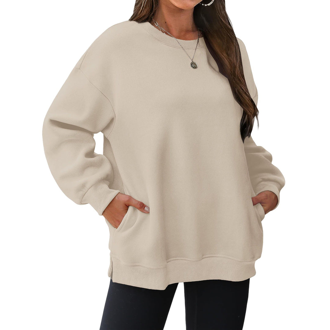 Damen verlängertes Oversize Rundhalspullover mit seitlichen Eingrifftaschen, Rippbündchen und überschnittener Schulter – Mavelle