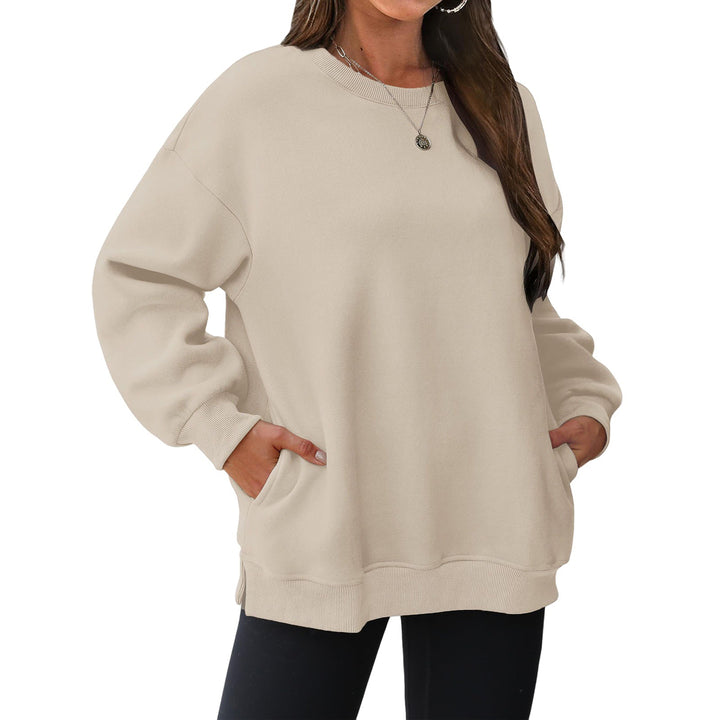 Damen verlängertes Oversize Rundhalspullover mit seitlichen Eingrifftaschen, Rippbündchen und überschnittener Schulter – Mavelle