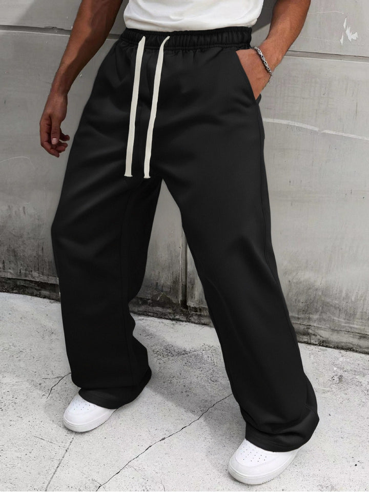 Herren Baggy-Jogginghose im Urban-Utility-Stil mit extra weitem Bein und sichtbarem Kordelzug Echo Archiv