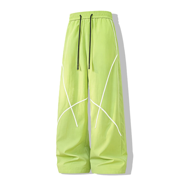 Herren Weite Funktions-Nylonhose mit Kordelbund, reflektierenden Nahtdetails & lässiger Baggy‑Silhouette Echoarchiv