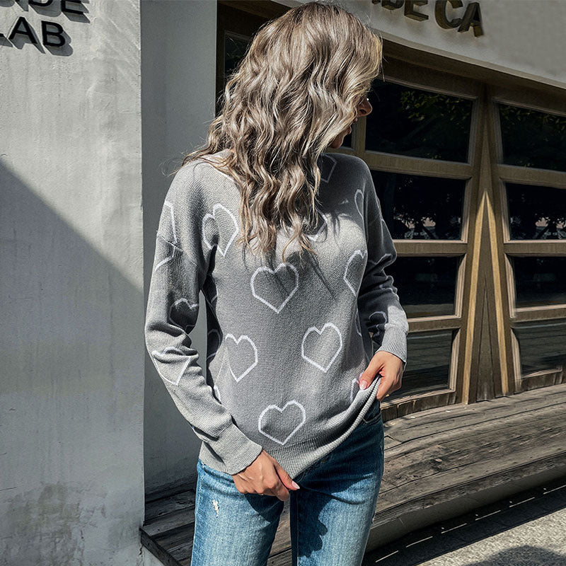 Damen Feinstrickpullover mit Herzmuster und legerer Passform Echoarchiv