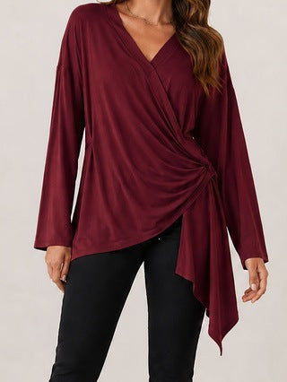 Damen Wickelshirt mit seitlicher Knotenpartie, V‑Ausschnitt und asymmetrischem Saum – Avérine