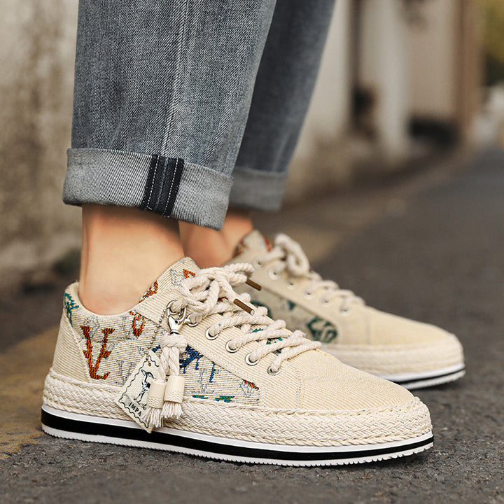 Damen Plateau-Espadrille-Sneaker mit besticktem Canvas, Quastenanhänger und geflochtener Bastsohle – Névara