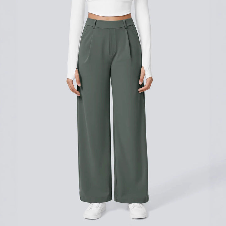 Damen nan hochgeschnittene Bundfaltenhose mit weitem Bein, Gürtelschlaufen und seitlichen Eingrifftaschen Echo Archiv