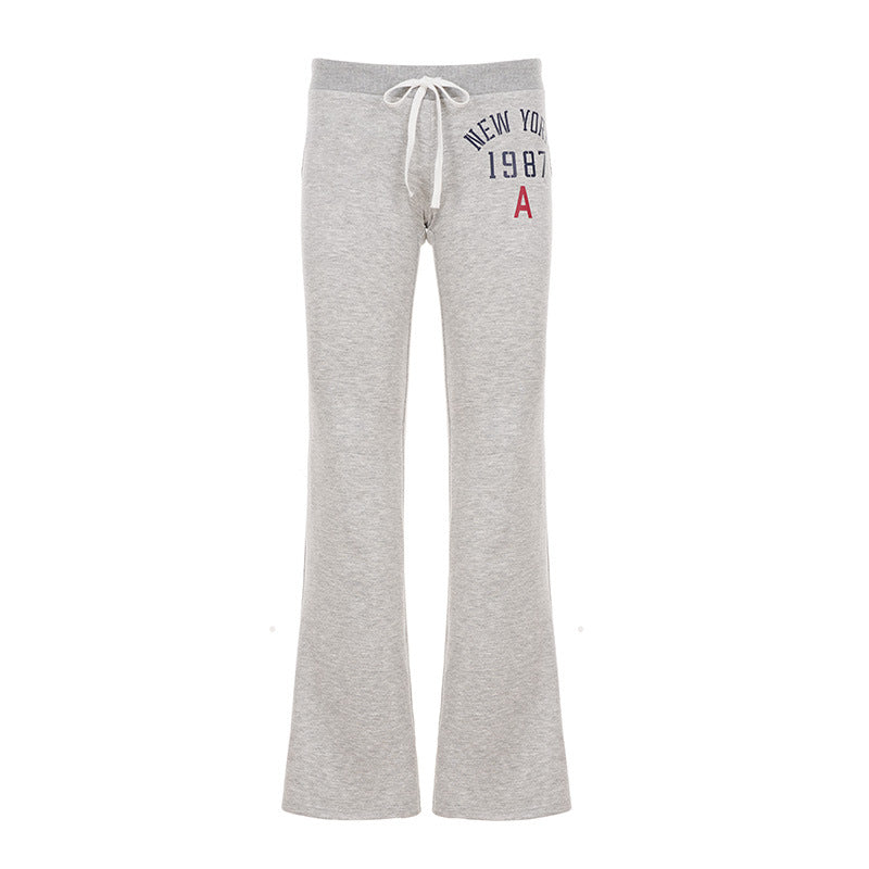Damen nan weiche Flared-Jogginghose mit Kordelzug, Eingrifftaschen und auffälligem Love-Print Echo Archiv