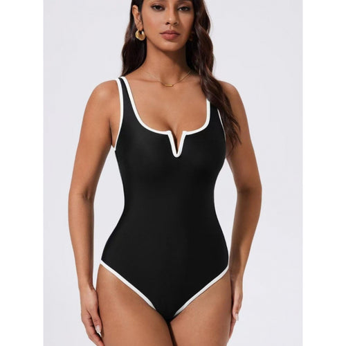 Damen Einteiliger Badeanzug mit tiefem V-Ausschnitt und kontrastierenden Details Echo Archiv