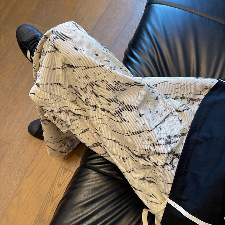 Herren Weit geschnittene Loungehose mit Marmorprint aus strukturiertem Jersey Echo Archiv