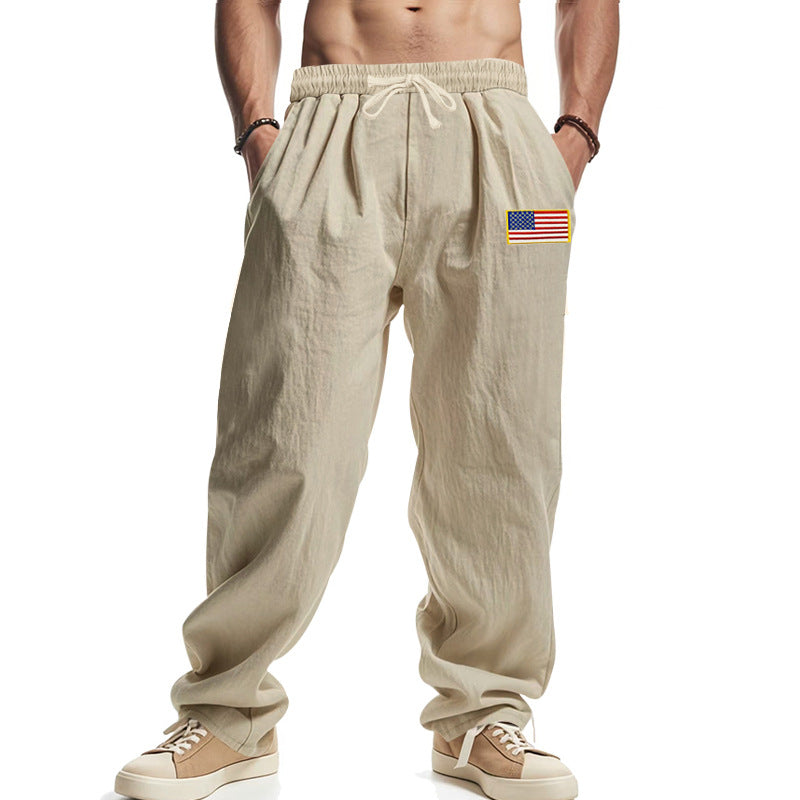 Herren Locker sitzende Freizeit-Hose im Leinen-Look mit elastischem Bund, Kordelzug & Flaggenpatch – Sorevano