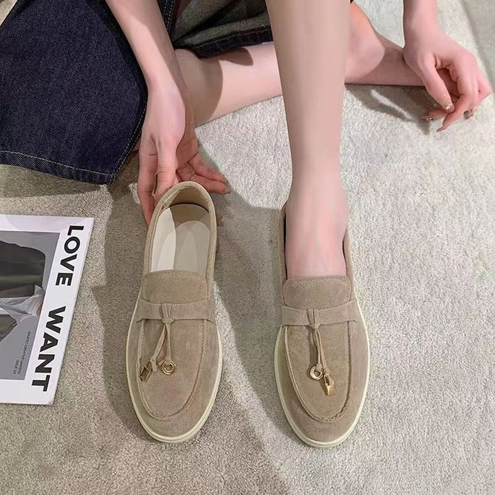 Damen Veloursleder Slipper mit dekorativer Quaste und profilierter Gummisohle Echo Archiv