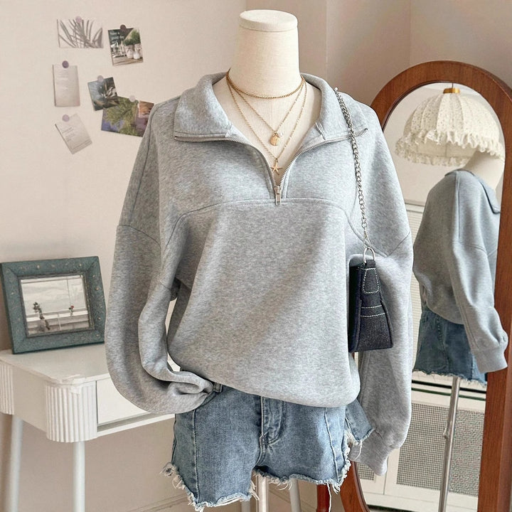 Damen nan Oversize Sweatshirt mit halbem Reißverschluss, Stehkragen und Ballonärmeln Echo Archiv