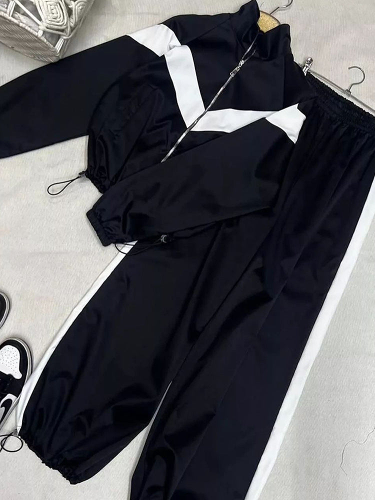 Damen nan Satin-Trackset mit Stehkragen, Chevron-Streifen und Kordelzug Echo Archiv