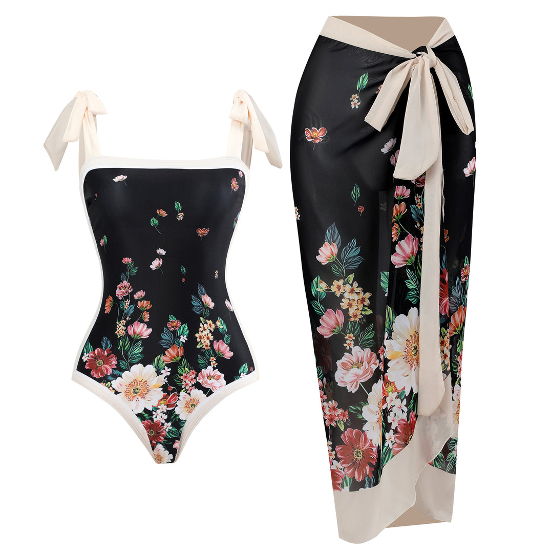 Damen Einteiler Badeanzug mit dekorativem Wickelrock und chicen Bindebändern Echo Archiv