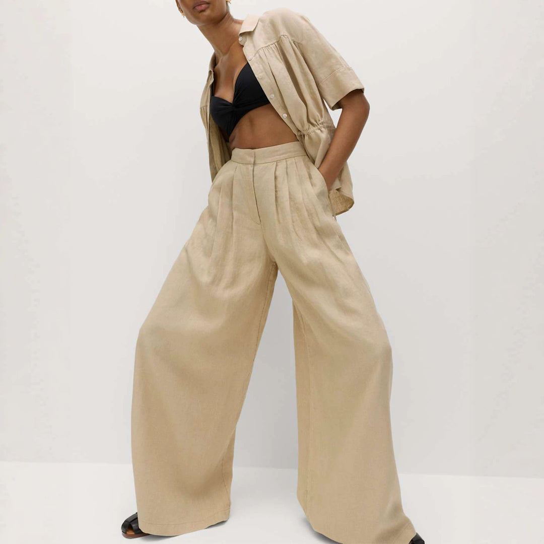 Damen Weite High‑Waist Leinenoptik Palazzo‑Hose mit Bundfalten und Eingrifftaschen – Avérine