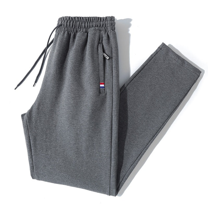 Herren Tapered-Jogginghose mit Tunnelzug, Reißverschlusstasche & Rippbündchen Echo Archiv
