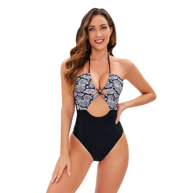 Damen Einteiler Badeanzug mit raffiniertem Schlangenmotiv und Cut-Out-Details Echo Archiv