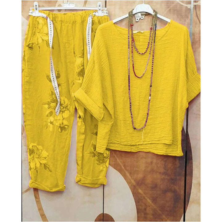 Damen nan leichtes Crinkle-Zweiteiler-Set mit lockerem U-Boot-Top und floral bedruckter Joggerhose Echo Archiv