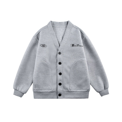 Unisex Boxy-Strickjacke im Waffelstrick mit V-Kragen, durchgehender Knopfleiste und aufgesetzten Rundtaschen Echoarchiv