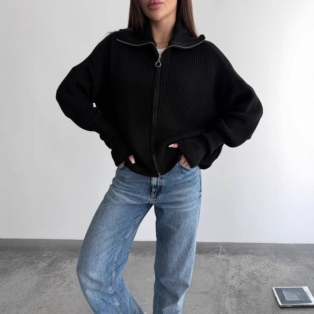 Damen Grobstrick-Zipper-Cardigan mit Ballonärmeln und Stehkragen Echoarchiv