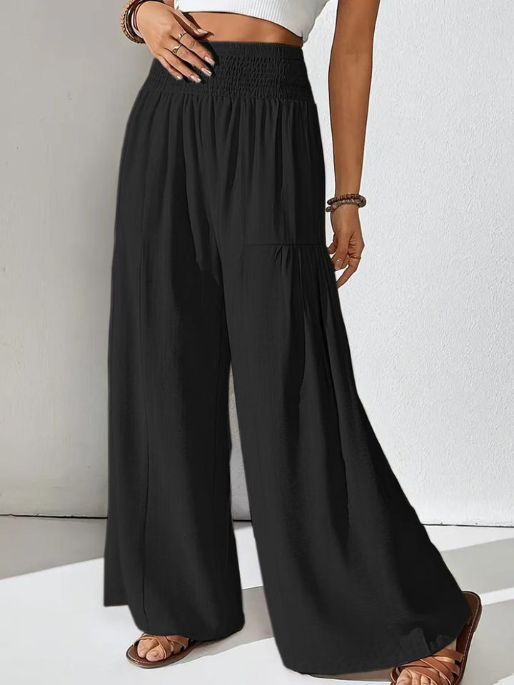 Damen weite Palazzo-Hose mit gerafftem Smock-Bund und Stufendetails – Avélisse