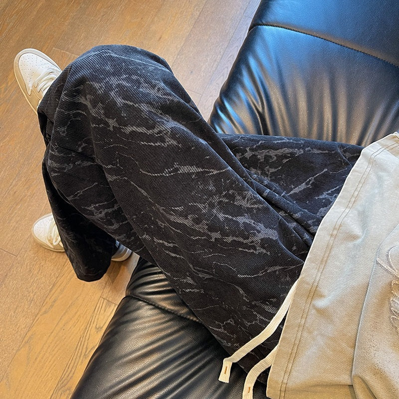 Herren Weit geschnittene Loungehose mit Marmorprint aus strukturiertem Jersey Echo Archiv