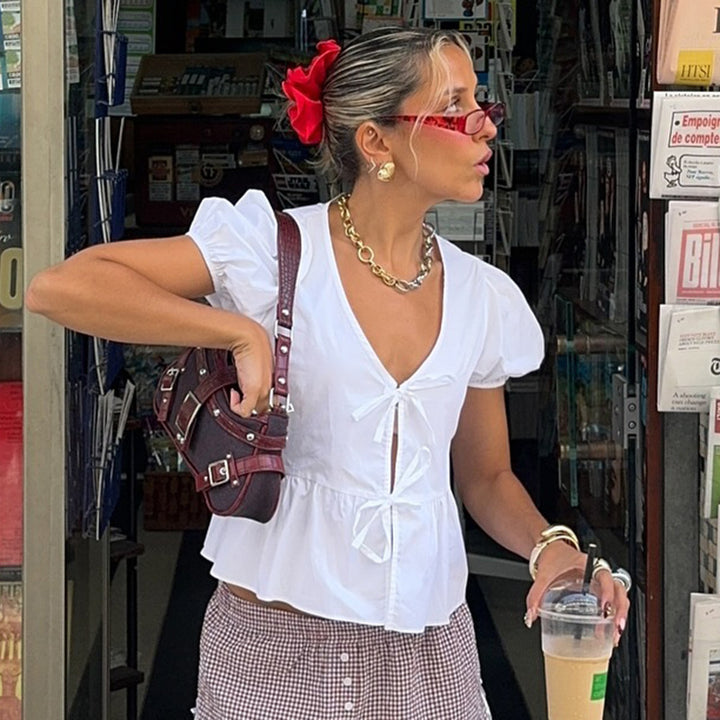 Damen Wickeloberteil mit Puffärmeln und femininem Peplum-Saum Echo Archiv