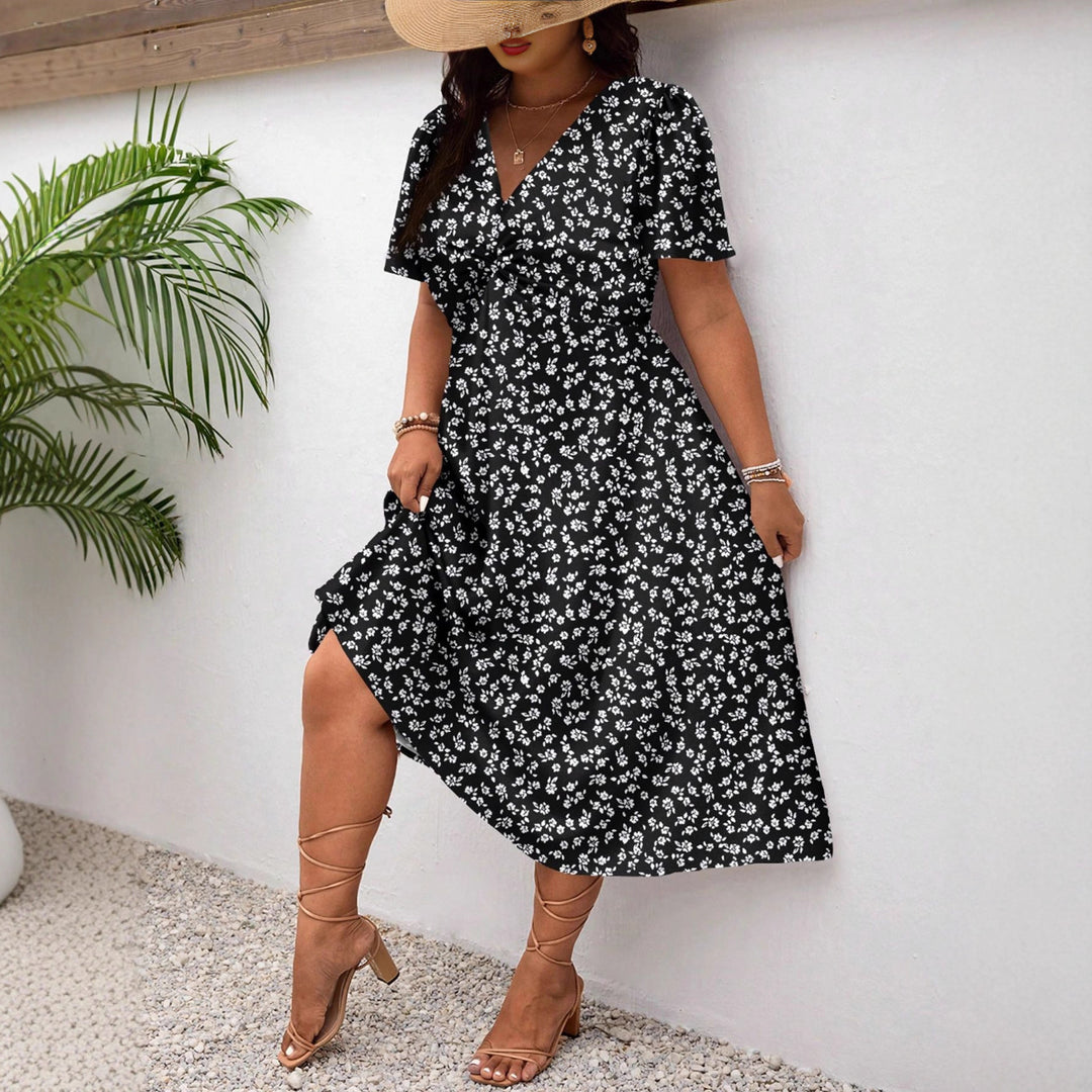 Damen Midi-Kleid mit Blumenmuster und vorteilhaftem Schlitz Echo Archiv