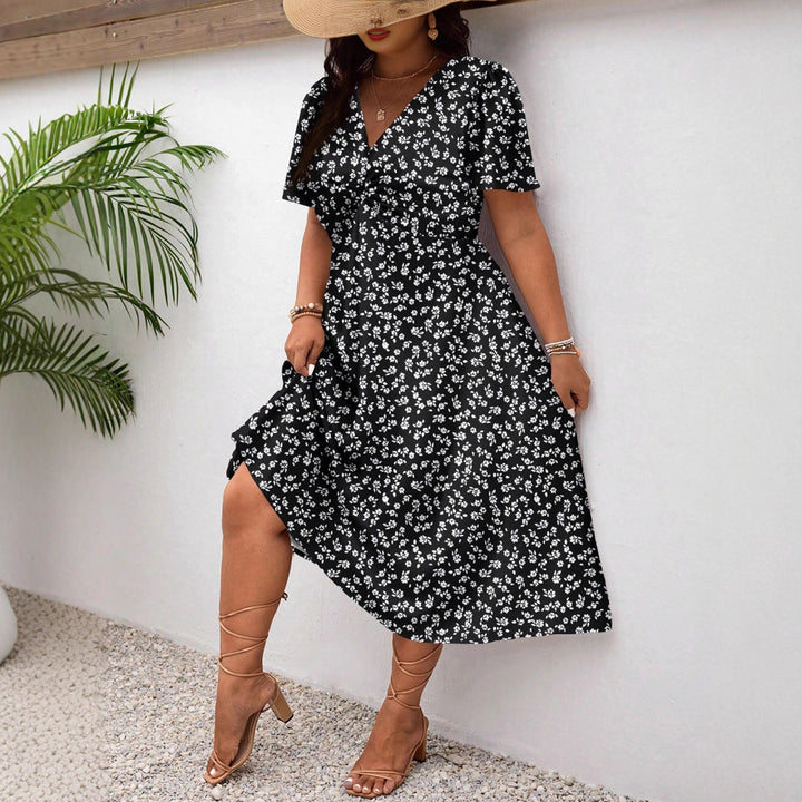Damen Midi-Kleid mit Blumenmuster und vorteilhaftem Schlitz Echo Archiv