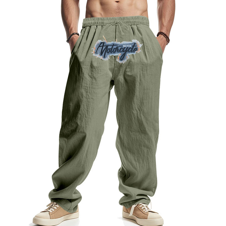 Herren Locker sitzende Leinenoptik-Relaxhose mit elastischem Bund, Kordelzug & Frontprint – Sorevano