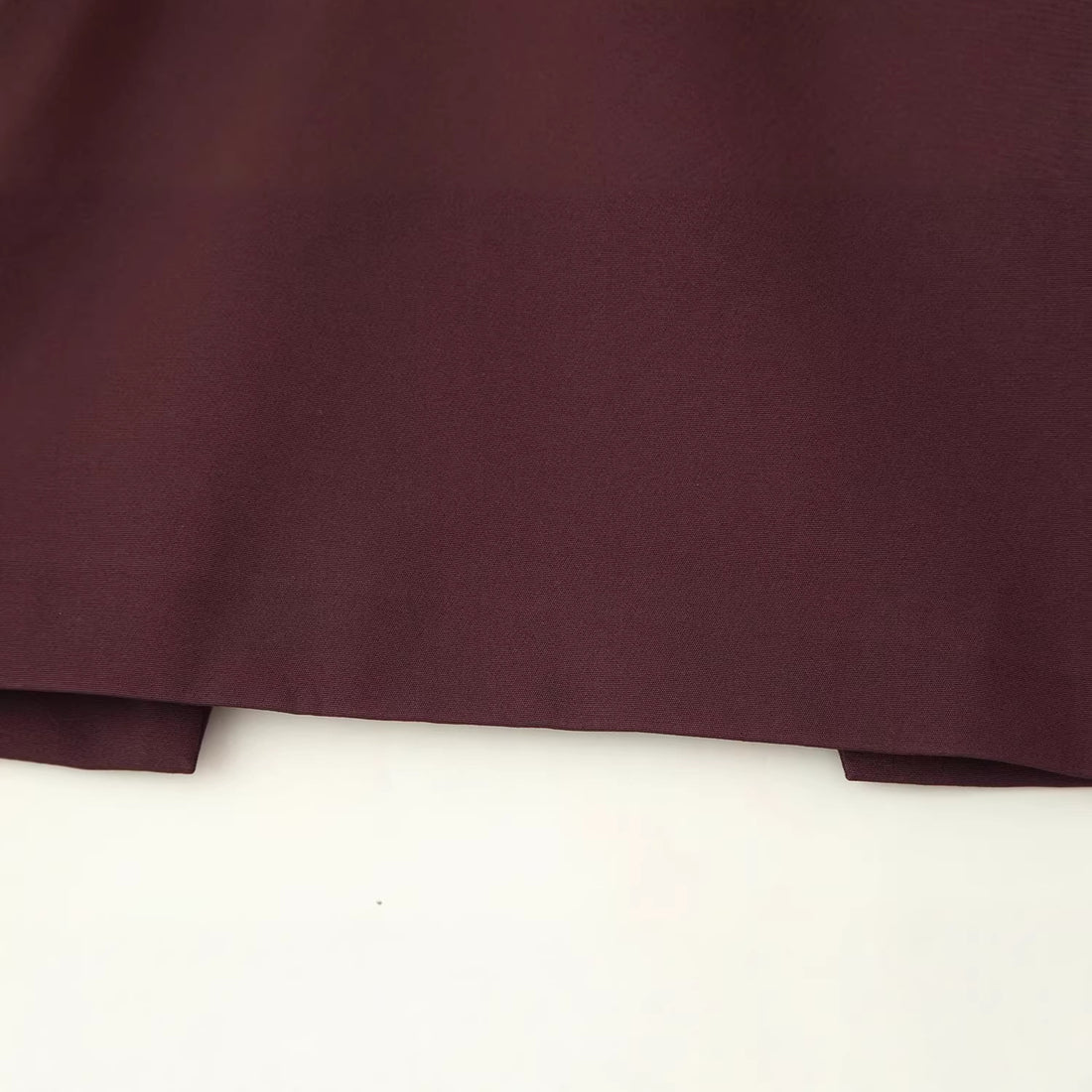 Damen Top mit Capelet-Überwurf und taillierter Peplum‑Silhouette Echoarchiv