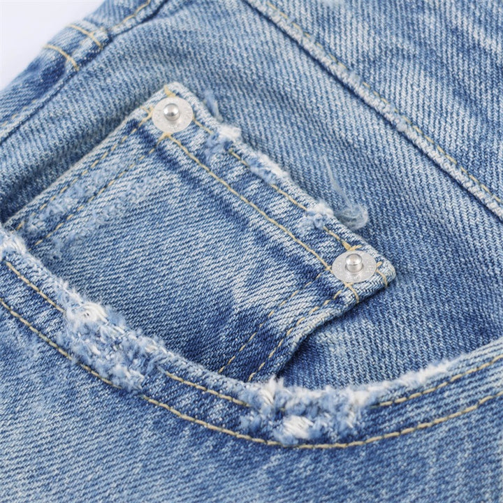 Damen Flared Jeans im Used-Look mit Fransen und Destroyed-Details Echo Archiv