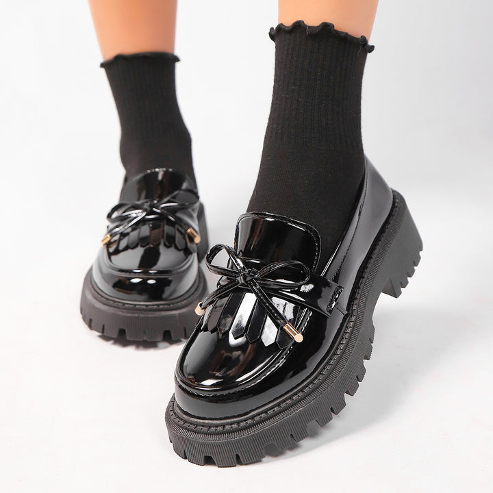 Damen  Lackoptik Loafer mit Quastenfransen Zierschleife und robuster Traktorsohle Echo Archiv