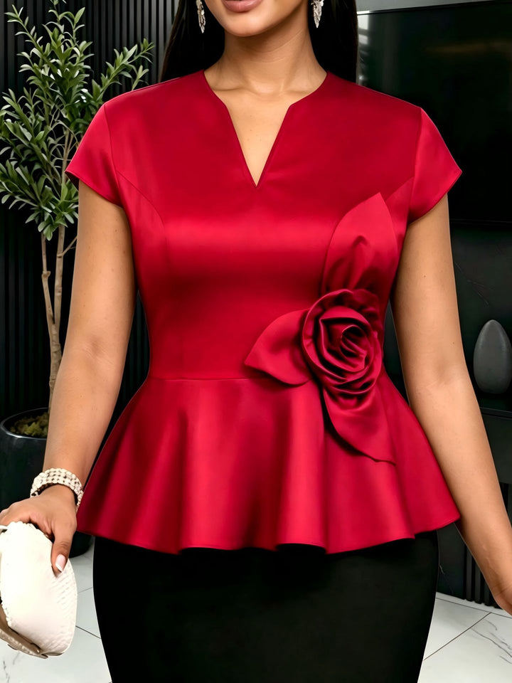 Damen elegantes Peplum-Oberteil mit floralem Detail Echo Archiv