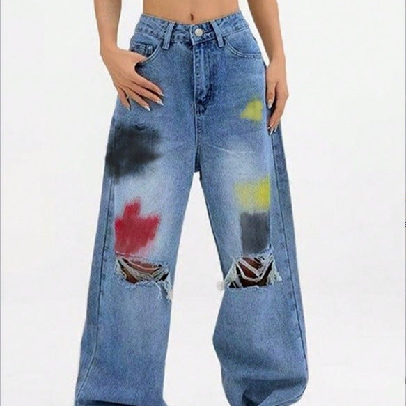 Damen weite Denim-Jeans mit Paint‑Splatter und Distressed-Knie Echo Archiv