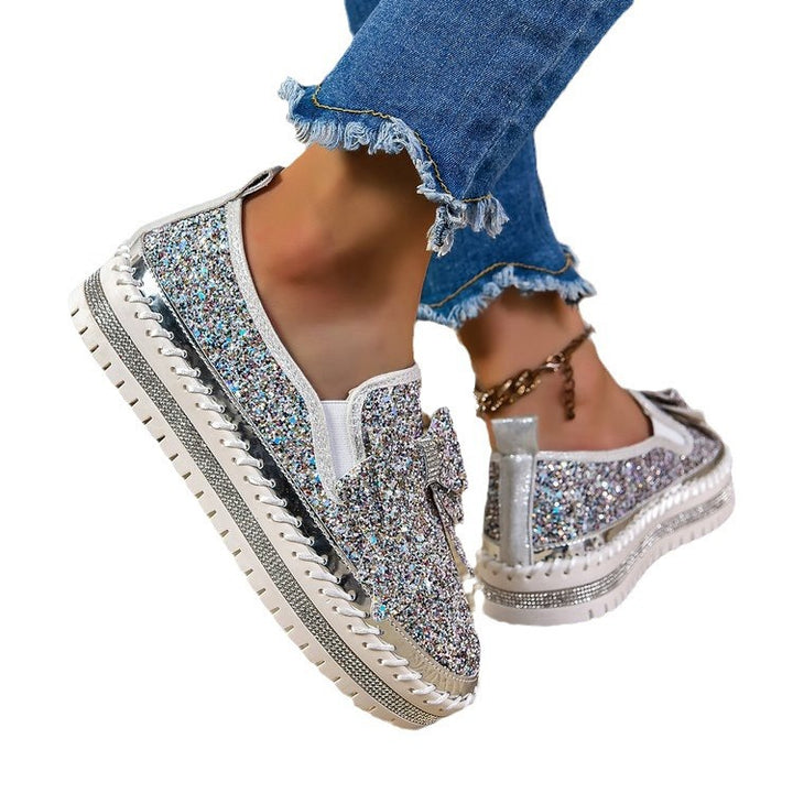 Damen Glitzer-Plateau-Slipper mit Schleifenapplikation und profilierter Komfortsohle Echo Archiv