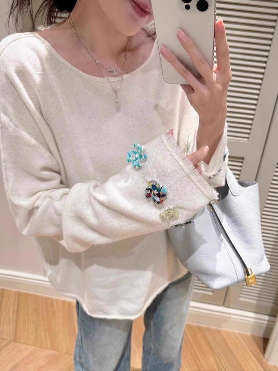 Damen Oversize-Feinstrickpullover mit schmuckbesetzten Ärmelabschlüssen Echoarchiv