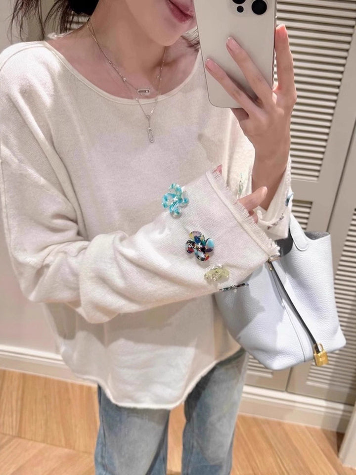 Damen Oversize-Feinstrickpullover mit schmuckbesetzten Ärmelabschlüssen Echoarchiv