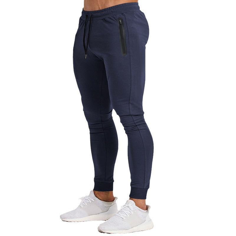 Herren schmal geschnittene Jogginghose mit Reißverschlusstaschen und Kordelzug Echoarchiv