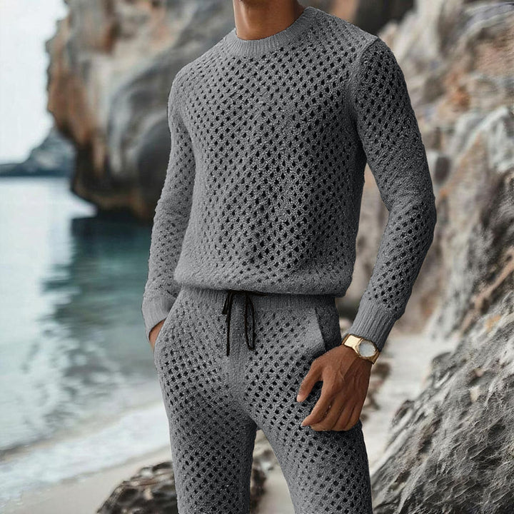 Herren Strukturstrick-Pullover mit feinmaschigem Lochmuster und Rundhals Echoarchiv