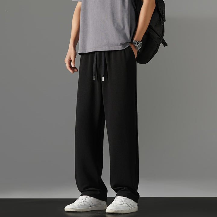 Herren weite Relaxed-Jogginghose aus French-Terry mit Kordelzug, elastischem Bund & geradem Bein Echoarchiv