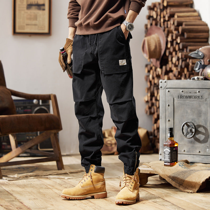 Herren Canvas‑Utility‑Jogger mit verstärkten Kniepaneelen, Klapptaschen und elastischem Knöchelsaum Echo Archiv