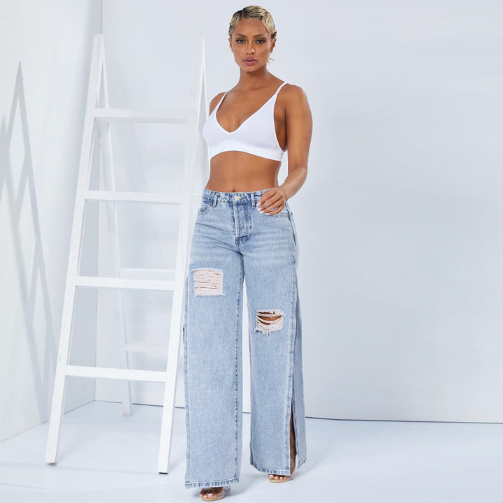 Damen weite High-Waist-Jeans mit seitlichen Beinschlitzen, Destroyed-Knie und formendem Bund Echo Archiv