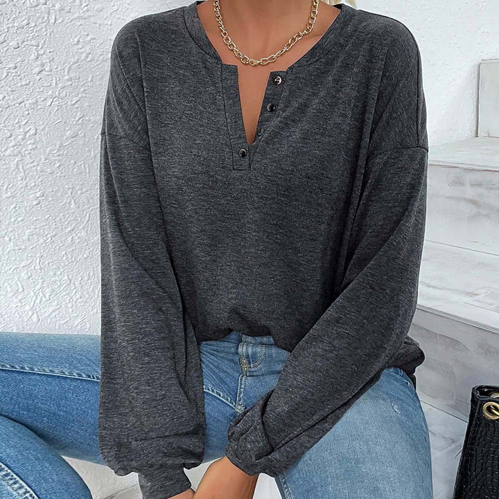Damen lässiges Oversize-Henley-Longsleeve mit V-Knopfleiste und Ballonärmeln – Avérine