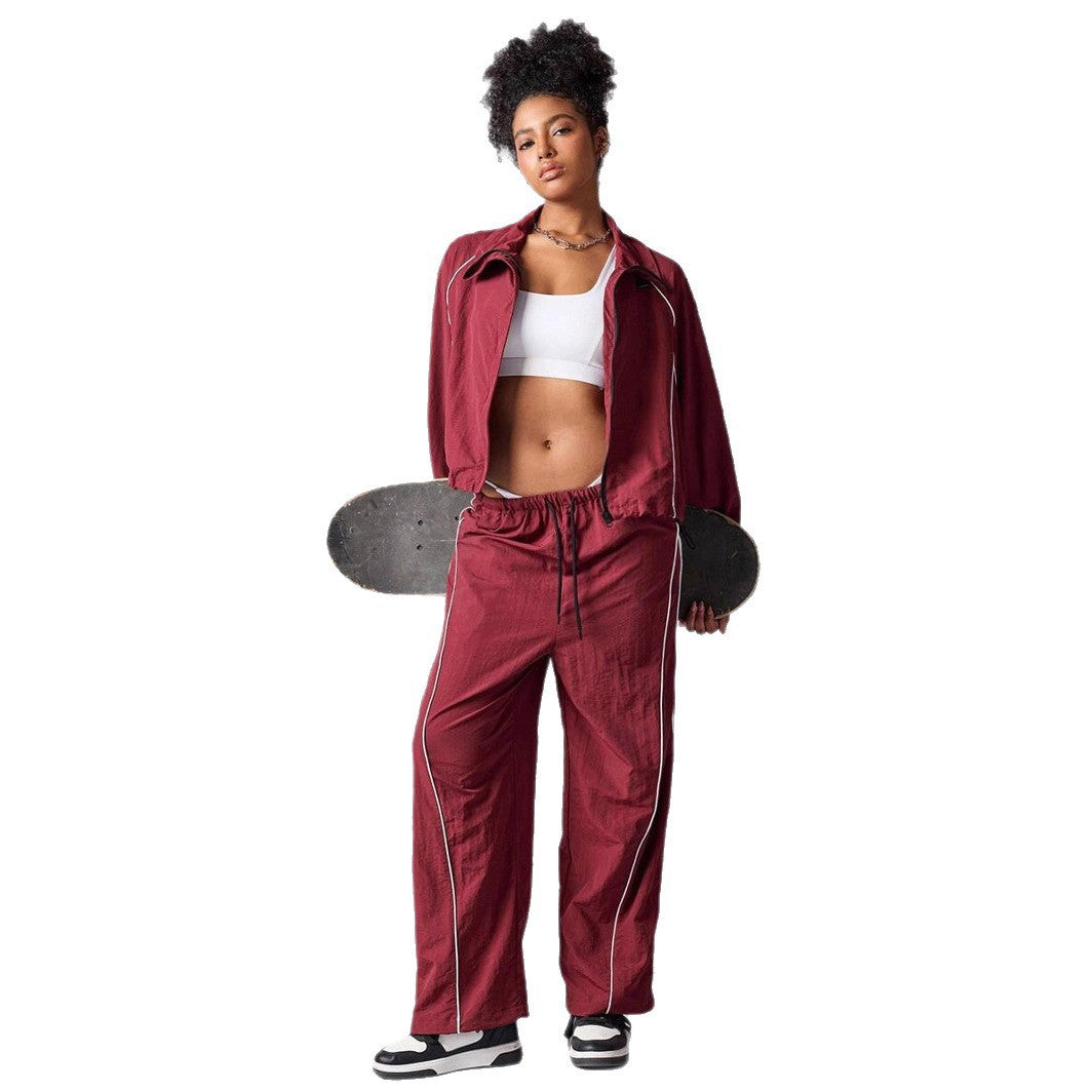 Damen sportives Cropped Windbreaker-Set mit Stehkragen Tunnelzug und reflektierenden Paspeln – Avérine