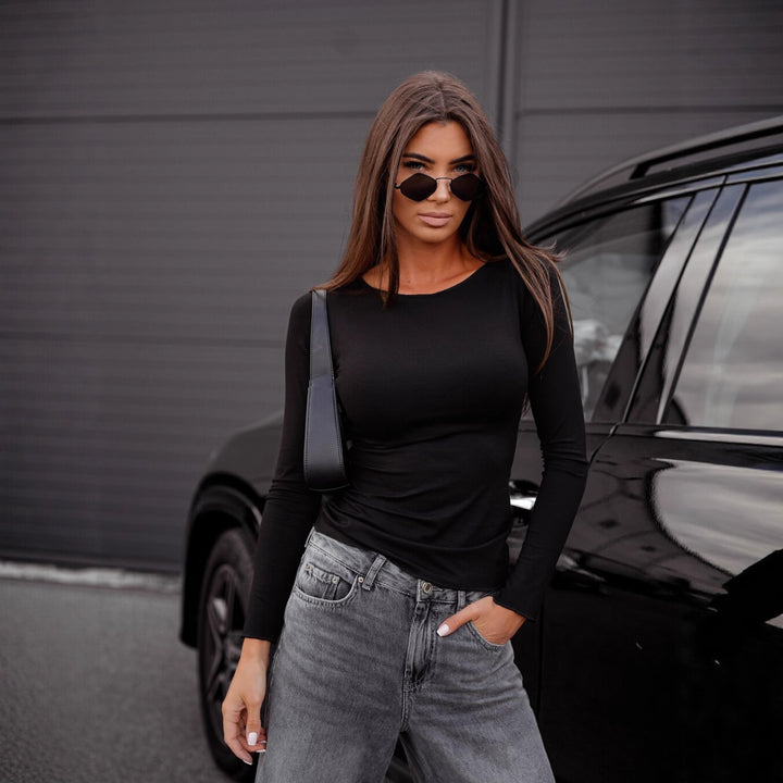 Damen figurbetontes Langarm-Shirt und weite High-Waist Denim-Jeans – Dénora
