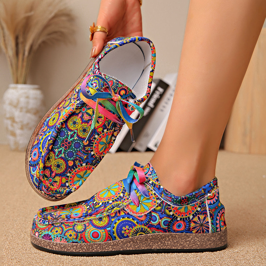 Damen Bequeme Plateau-Slipper im Ethno‑Print mit Korkoptik‑Sohle Echo Archiv