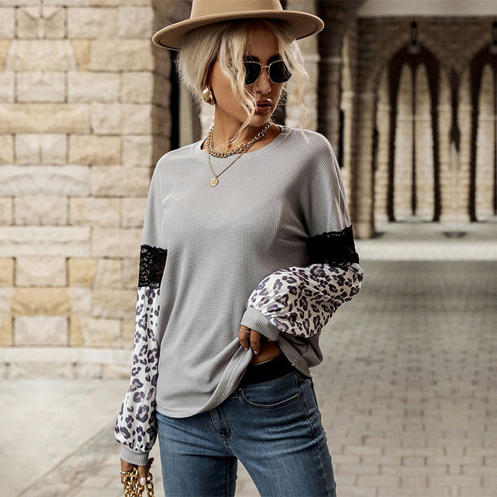 Damen Langarmshirt mit Leopardenärmeln und Spitzenbesatz Echoarchiv