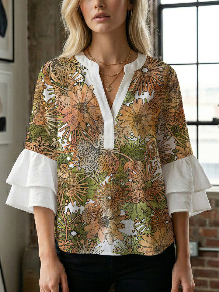 Damen Bluse mit voluminösen Rüschenärmeln und kreativem Floraldesign Echo Archiv