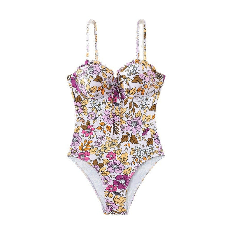 Damen Einteiliger Badeanzug mit floralem Design und traumhaftem Ausschnitt Echo Archiv