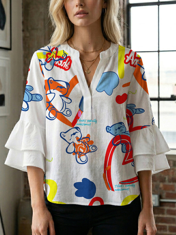 Damen Bluse mit voluminösen Rüschenärmeln und modernem Motiv Echo Archiv